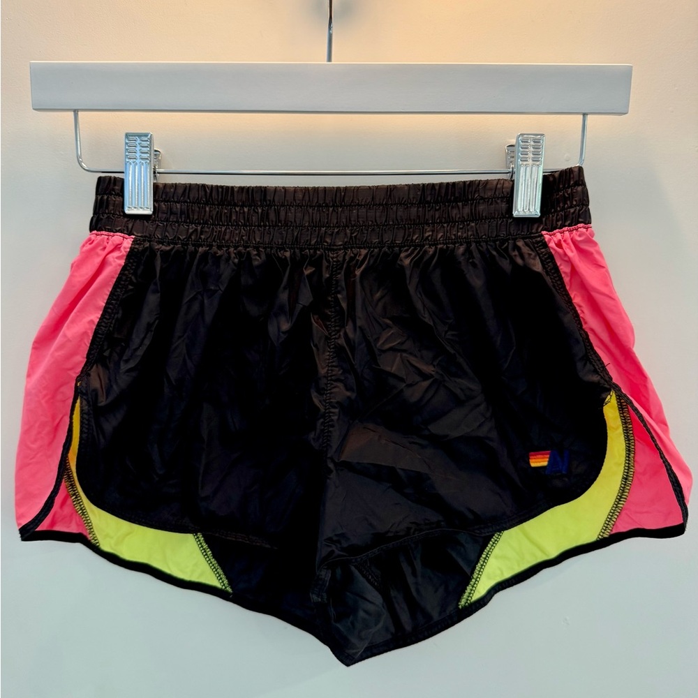 Aviator Nation Black Jogger Shorts with neon pink and yellow side stripe